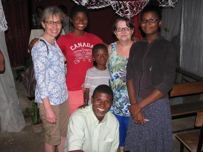 Pastor Belade and his children with Donna and Bonnie.